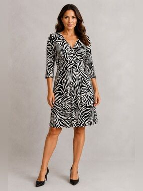 Diane Von Furstenburg 100% Silk Enola 
Faux Wrap Zebra Print Dress
Size 10